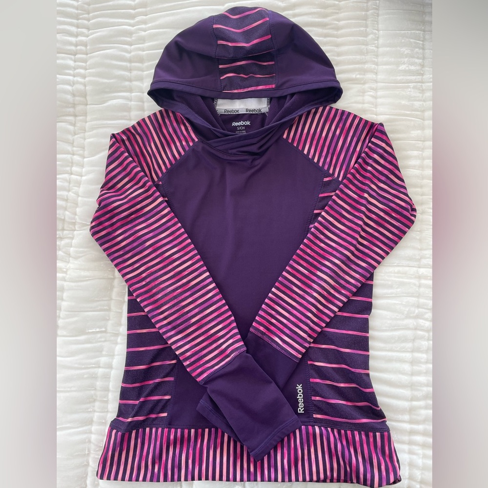 Reebok pink and purple S athletic pull over with hood and thumb holes